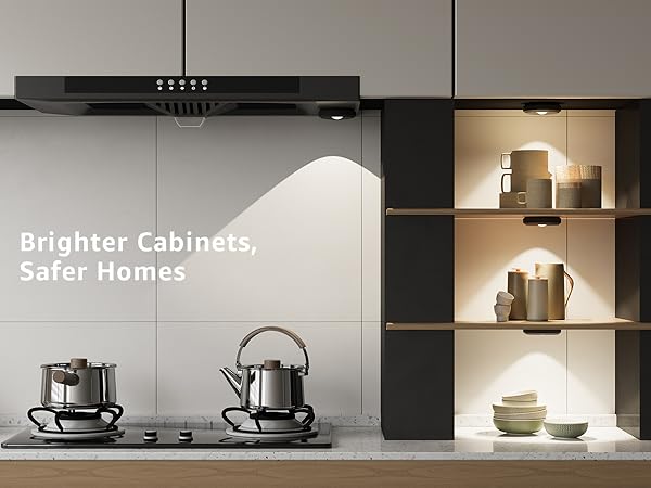 Modern kitchen with black cabinets and white tiled wall, featuring text 'Brighter Cabinets, Safer Homes'.