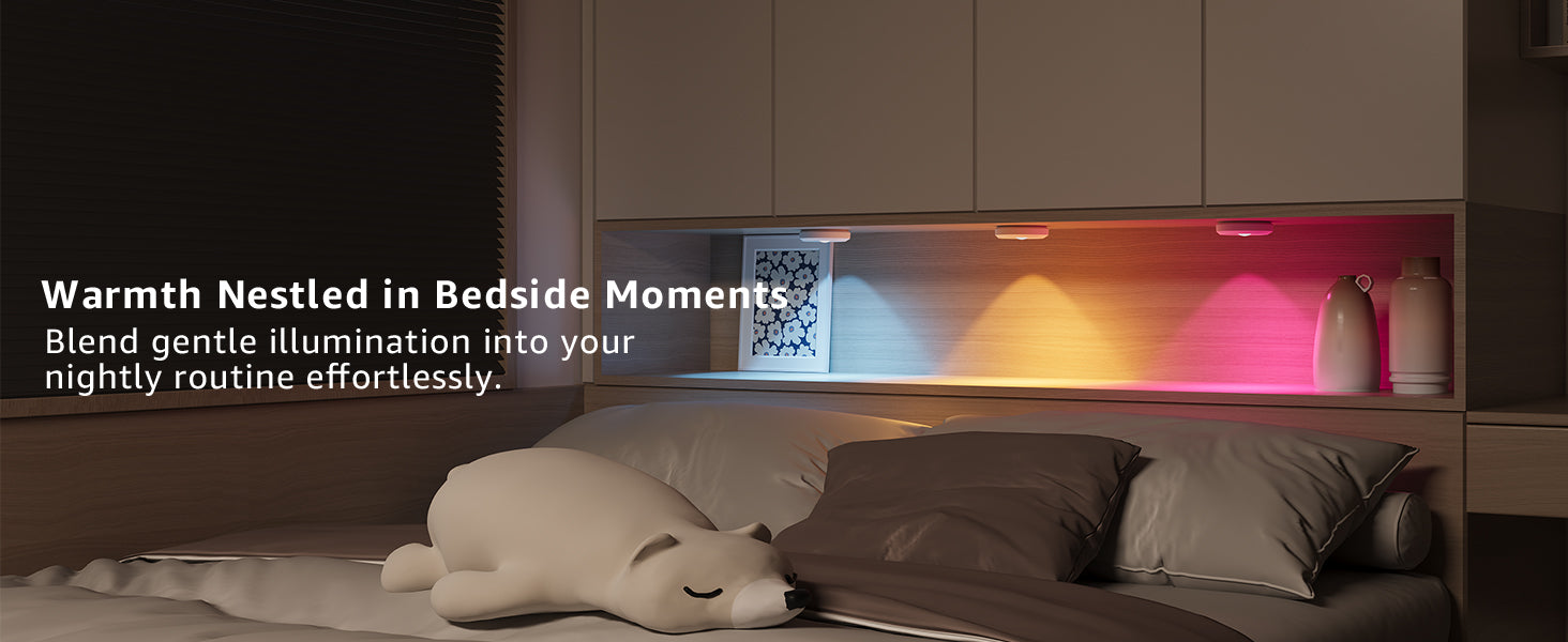 Bedroom scene with a nightstand night puck lights featuring colorful LED lights and a plush toy.