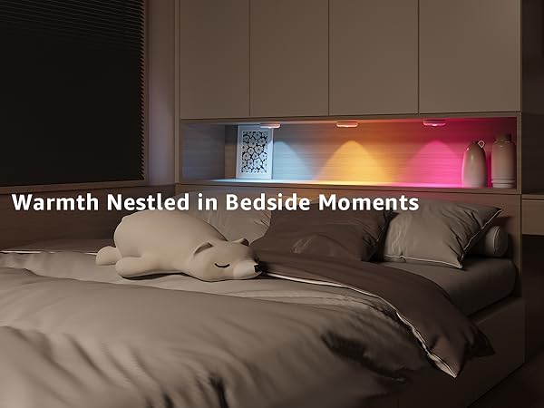 Bedroom scene with a nightlight shaped night light like a bear and colorful light display on a shelf.