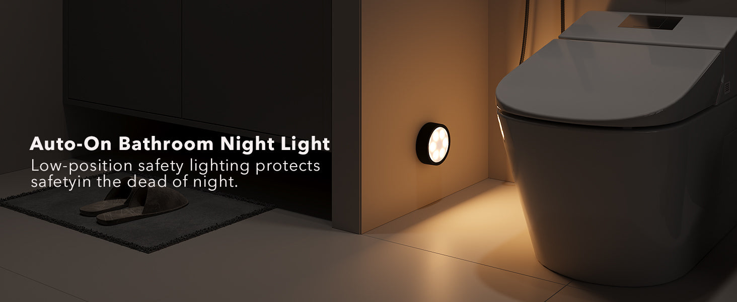 motion sensor puck light glowing in bathroom corner